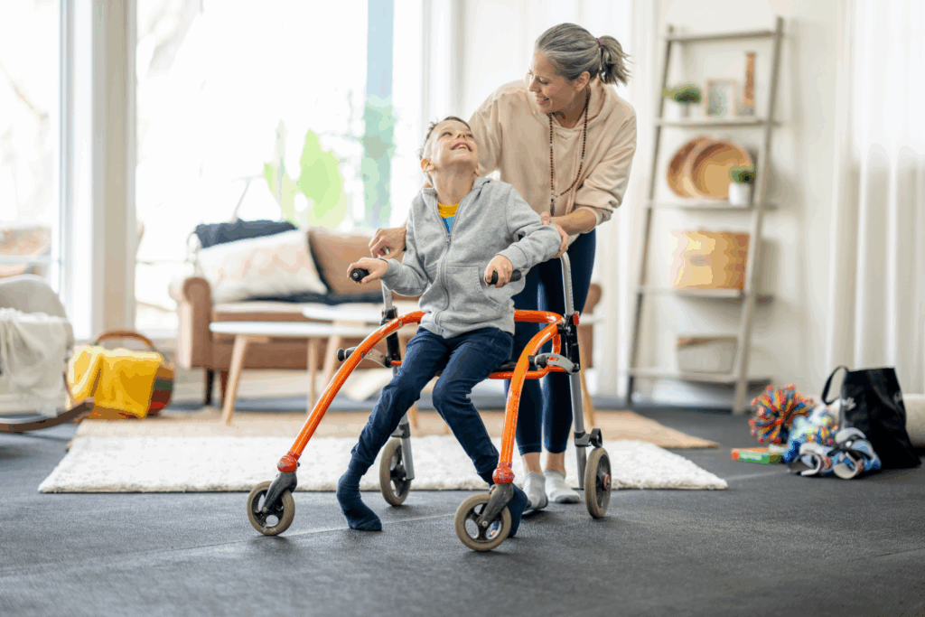 Child in a wheelchair with a woman, they are smiling at each other